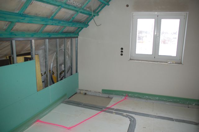 062_2 Fussbodendaemmung und erster Trockenbau.jpg
